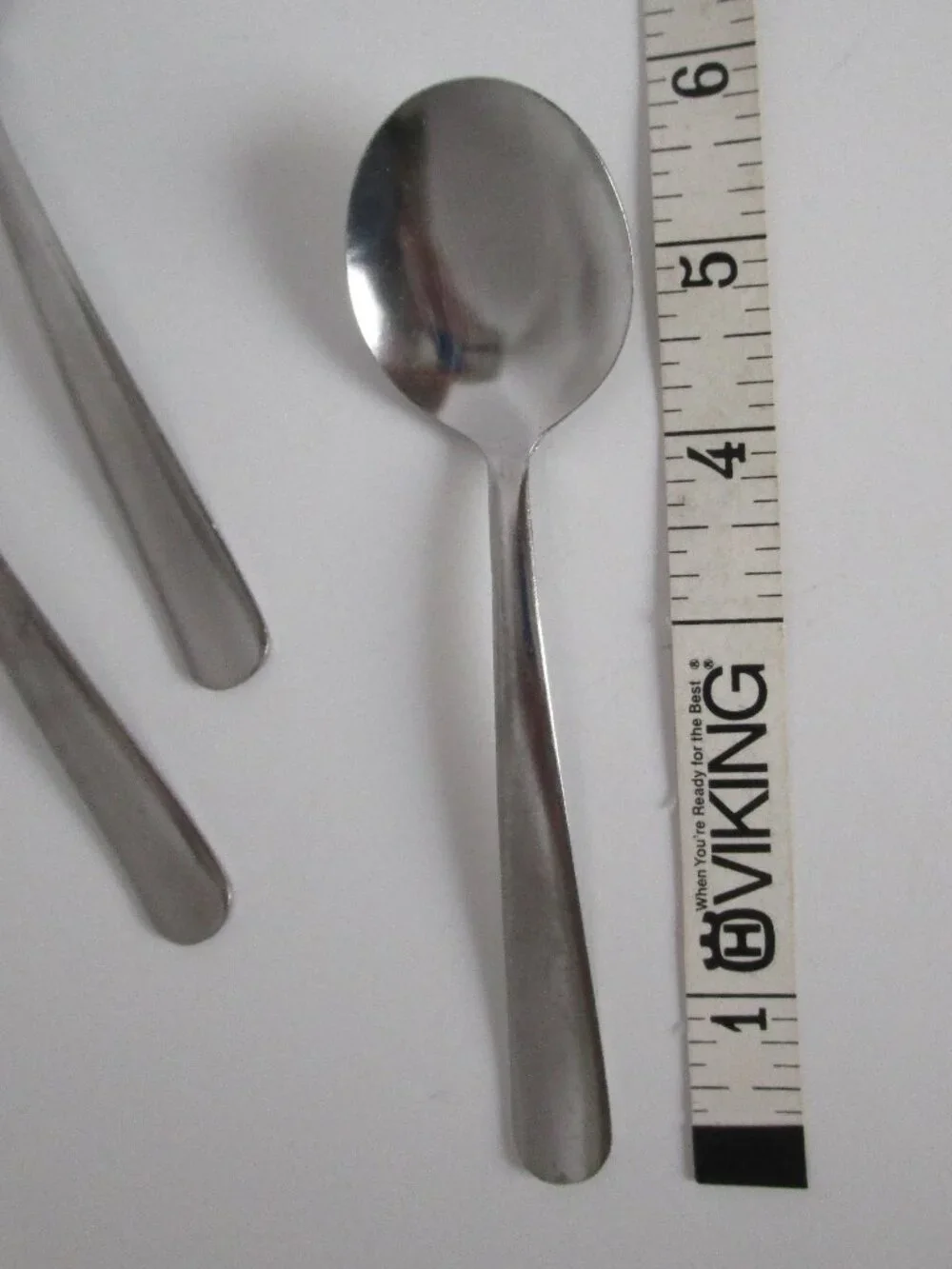 set of stainless steel soup spoons